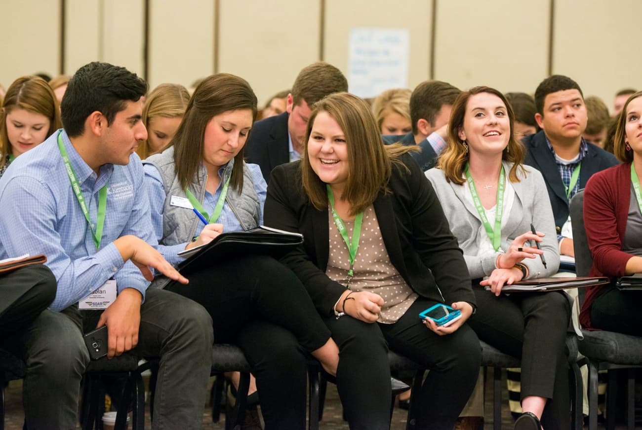 Girl smiling at conference